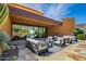 Inviting outdoor patio with comfortable seating, perfect for relaxing and enjoying the desert scenery at 43105 N 102Nd St, Scottsdale, AZ 85262