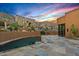 Southwestern backyard with a pool, desert landscape, and mountain views at 43105 N 102Nd St, Scottsdale, AZ 85262