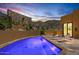 Tranquil desert home featuring a private pool, luxurious sun loungers, and serene desert views at 43105 N 102Nd St, Scottsdale, AZ 85262