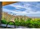 Expansive views of the surrounding desert landscape from the home's large windows, bringing nature indoors at 43105 N 102Nd St, Scottsdale, AZ 85262