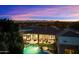 Stunning backyard featuring a pool, covered patio, and city views at 6621 N Arizona Biltmore Cir, Phoenix, AZ 85016