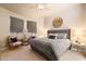 Charming bedroom with patterned roman shades, plush bed, and designer mirror accents for a stylish retreat at 6621 N Arizona Biltmore Cir, Phoenix, AZ 85016