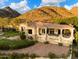 Beautiful home with mountain views, spacious driveway, and manicured lawn at 6621 N Arizona Biltmore Cir, Phoenix, AZ 85016