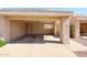 Spacious carport providing covered parking and easy access to the home's entrance at 10 E Betty Elyse Ln, Phoenix, AZ 85022