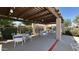 Community patio features outdoor seating under a covered pergola at 10 E Betty Elyse Ln, Phoenix, AZ 85022
