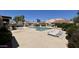 Community pool area includes many lounge chairs and nearby landscaping at 10 E Betty Elyse Ln, Phoenix, AZ 85022