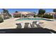 Sparkling community pool features lounge chairs and well-maintained landscaping at 10 E Betty Elyse Ln, Phoenix, AZ 85022