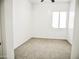 Simple bedroom with carpet, window, and a ceiling fan at 1024 W Ayrshire Trl, San Tan Valley, AZ 85143