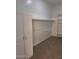 Walk-in closet includes a closet organizer, built-in shelving, and neutral carpet at 1024 W Ayrshire Trl, San Tan Valley, AZ 85143