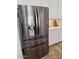 Stainless steel refrigerator with water dispenser and cabinets at 1024 W Ayrshire Trl, San Tan Valley, AZ 85143