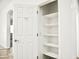 Pantry closet featuring multiple shelves for organized storage at 1024 W Ayrshire Trl, San Tan Valley, AZ 85143
