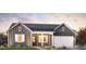 Charming single-story home with gray siding, white trim, and a well-manicured front yard at 10841 N Blakely St, Surprise, AZ 85388