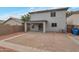 Fenced backyard featuring desert landscaping and covered patio at 11218 W Glenrosa Ave, Phoenix, AZ 85037