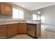Kitchen with stainless steel appliances, granite countertops, and tiled floors at 11218 W Glenrosa Ave, Phoenix, AZ 85037