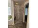 Modern shower with sleek design and ample space, adjacent to a soaking tub at 11760 N 153Rd Ave, Surprise, AZ 85379