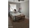 Cozy bedroom features a comfy bed, calming colors, and natural light through the window at 11760 N 153Rd Ave, Surprise, AZ 85379