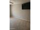 Bedroom with neutral paint, carpet and modern TV at 11760 N 153Rd Ave, Surprise, AZ 85379