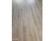 Close-up of the beautiful and modern wood-look flooring throughout the home at 11760 N 153Rd Ave, Surprise, AZ 85379
