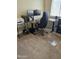 Functional home office space features a large desk setup with dual monitors and an ergonomic chair at 11760 N 153Rd Ave, Surprise, AZ 85379