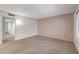 Spacious bedroom with carpet, wallpaper, and ample closet space at 14123 W Yosemite Dr, Sun City West, AZ 85375