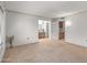 Spacious bedroom featuring an en-suite bathroom and large window at 14123 W Yosemite Dr, Sun City West, AZ 85375
