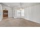 Cozy dining area with carpet, ample lighting, and a view of the built-in cabinets at 14123 W Yosemite Dr, Sun City West, AZ 85375
