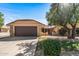 Inviting single-Gathering home with attached garage and a well-manicured front yard at 14123 W Yosemite Dr, Sun City West, AZ 85375