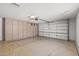 Garage featuring extra storage and ample space for vehicles and projects at 14123 W Yosemite Dr, Sun City West, AZ 85375