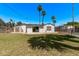 Large backyard displaying well-kept grass, a storage shed, and an enclosed pool area ideal for relaxation and activities at 1431 E San Juan Ave, Phoenix, AZ 85014