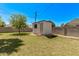 Backyard with a storage shed, offering practical space for gardening tools and outdoor equipment at 1431 E San Juan Ave, Phoenix, AZ 85014