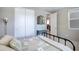 Bedroom boasts comfortable bedding, closet, and a natural-light window at 14770 W Voltaire St, Surprise, AZ 85379