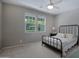 Bright bedroom features ample natural light and a comfortable bed at 14770 W Voltaire St, Surprise, AZ 85379