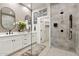 Contemporary bathroom featuring a glass-enclosed shower and dual vanity at 15240 N Clubgate Dr # 137, Scottsdale, AZ 85254