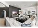 Open-concept living room with a modern feel, connecting to the kitchen with sleek decor at 15240 N Clubgate Dr # 137, Scottsdale, AZ 85254