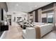 Bright, open-concept living room flows to kitchen, with a neutral color palette and modern decor at 15240 N Clubgate Dr # 137, Scottsdale, AZ 85254