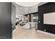 Spacious living area with modern design, seamless flow into the kitchen and sleek decor at 15240 N Clubgate Dr # 137, Scottsdale, AZ 85254