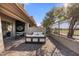 Well-appointed patio with outdoor seating, bar area, and a great view of the golf course at 15240 N Clubgate Dr # 137, Scottsdale, AZ 85254