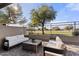 Inviting outdoor patio with comfortable seating and views of the lush green golf course beyond at 15240 N Clubgate Dr # 137, Scottsdale, AZ 85254