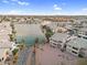 Community aerial view overlooking lake, highlighting nearby homes and condos at 16013 S Desert Foothills Pkwy # 2130, Phoenix, AZ 85048