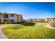A large green space with walking path in a well-maintained apartment community at 16013 S Desert Foothills Pkwy # 2130, Phoenix, AZ 85048