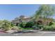 Attractive building exterior with desert landscaping and ample parking available at 16013 S Desert Foothills Pkwy # 2130, Phoenix, AZ 85048