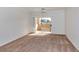 Spacious carpeted room with sliding glass doors leading to an outdoor area at 16013 S Desert Foothills Pkwy # 2130, Phoenix, AZ 85048