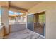 A spacious patio with an open view and a sliding glass door leading inside at 16013 S Desert Foothills Pkwy # 2130, Phoenix, AZ 85048