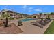 Inviting community pool with plenty of seating, ideal for summer relaxation and socializing at 16013 S Desert Foothills Pkwy # 2130, Phoenix, AZ 85048