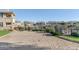 A well-maintained sand volleyball court surrounded by beautiful landscaping in a community setting at 16013 S Desert Foothills Pkwy # 2130, Phoenix, AZ 85048