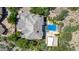 Overhead aerial view of the property, highlighting the pool, lush surroundings and privacy at 16469 N 113Th Way, Scottsdale, AZ 85255