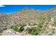 Expansive aerial view of the property, demonstrating the beautiful home surrounded by the desert landscape at 16469 N 113Th Way, Scottsdale, AZ 85255