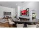 Entertainers home bar features marble countertops, seating, and custom display shelving at 16469 N 113Th Way, Scottsdale, AZ 85255