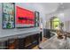 Home bar area with marble countertops, custom cabinetry, and sophisticated design at 16469 N 113Th Way, Scottsdale, AZ 85255