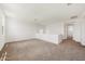 Upstairs loft featuring carpet flooring and lots of natural light at 17250 W Via Dona Rd, Surprise, AZ 85387